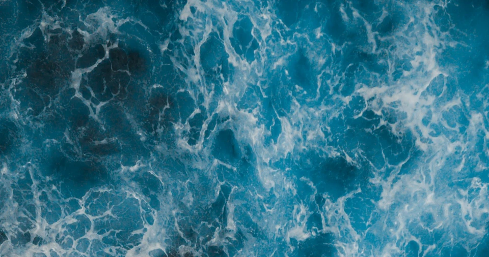 Image of stormy sea waves from above